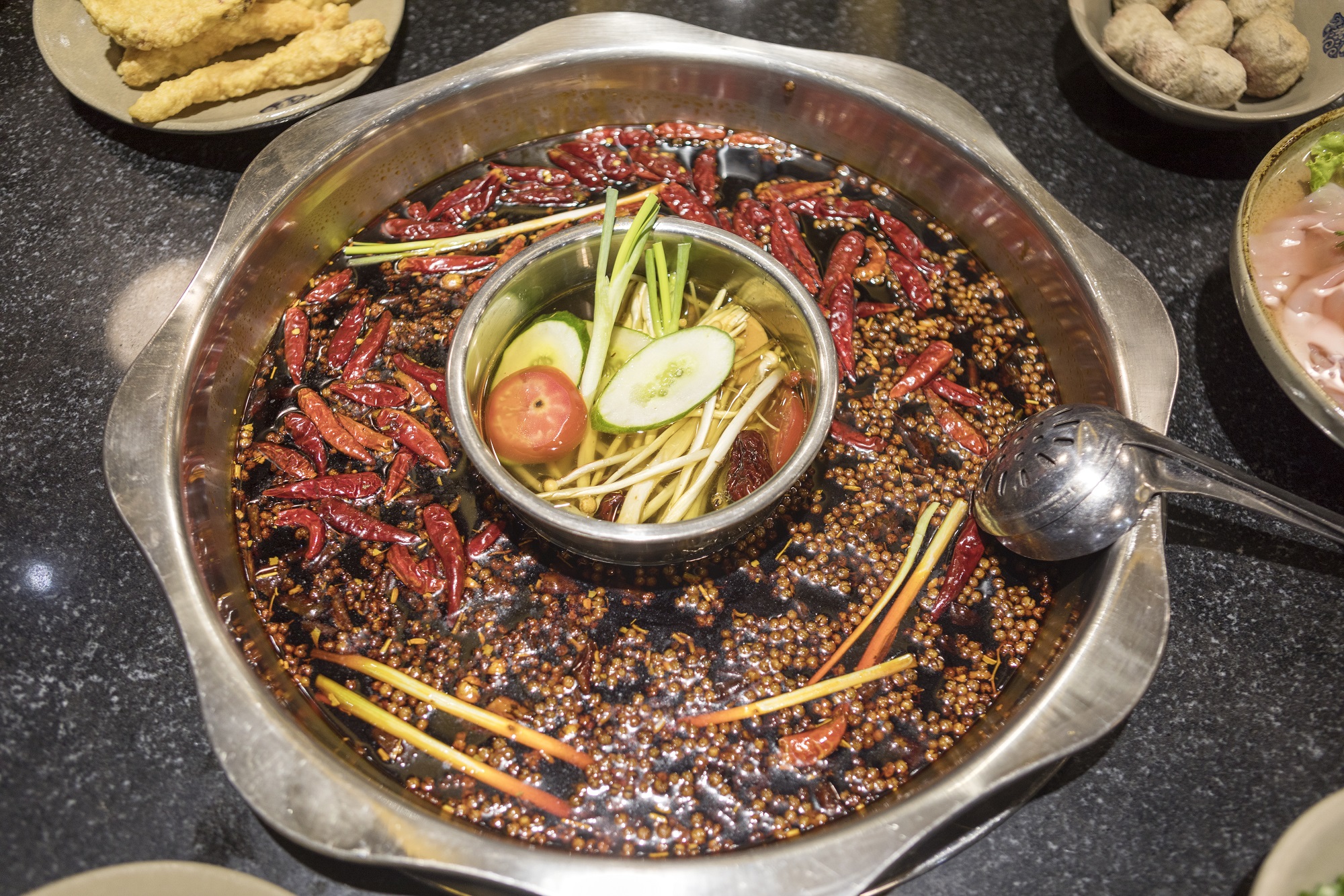 Scharfer Feuertopf – klassische Sichuan-Küche