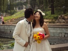 Posieren fürs Hochzeitsfoto im Taoranting Park